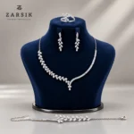 Modern Asymmetrical Leaf 925 Silver Jewellery Set displayed on a dummy