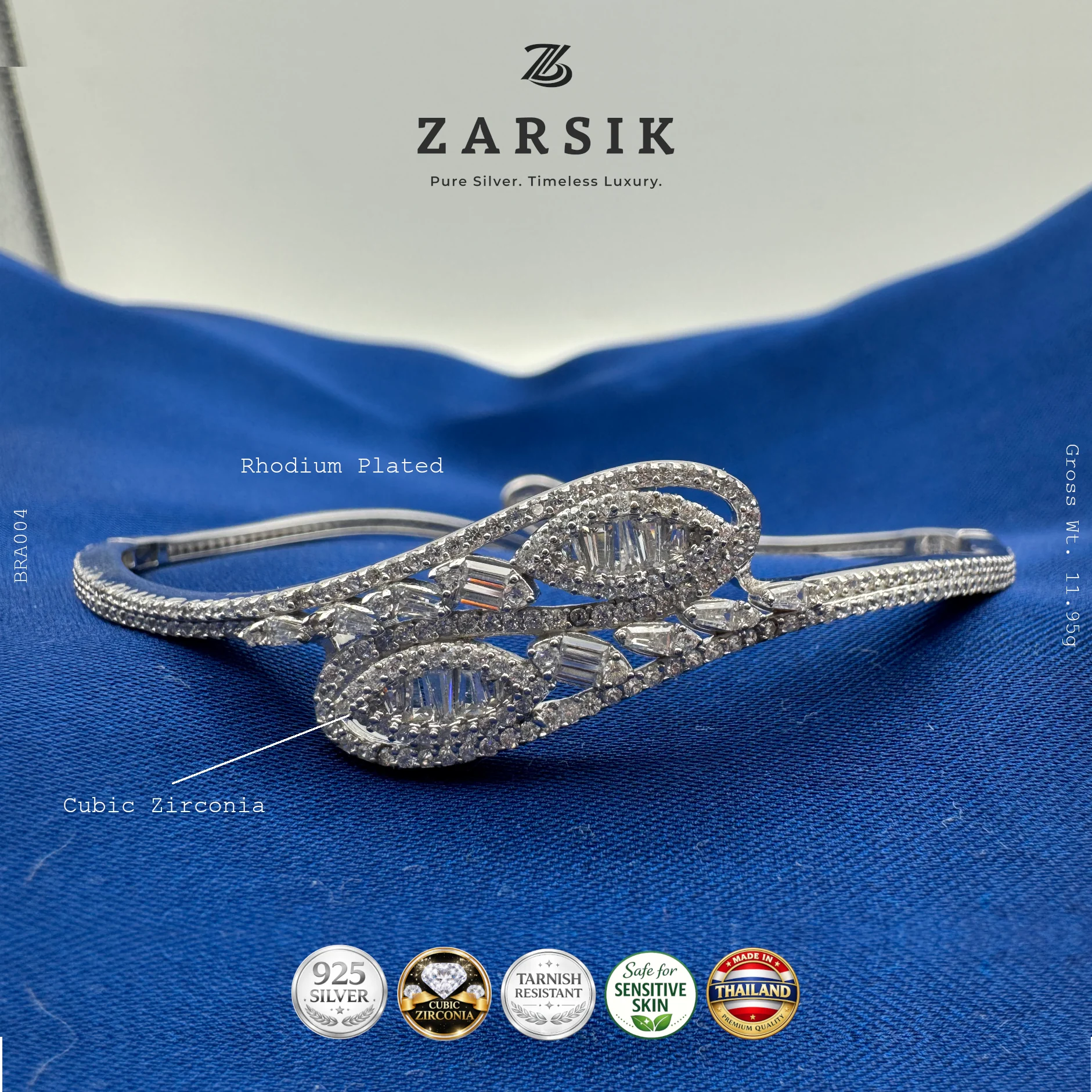 BR004_1 - Copy • Rhodium plated sterling silver bracelet with leaf inspired design