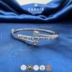 Elegant 925 sterling silver open cuff bracelet with baguette and emerald-cut cubic zirconia stones, rhodium plated luxury jewellery for women
