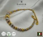 Tri-tone 925 sterling silver beaded bracelet with 18K gold, rose gold, and rhodium plating, Italian-made luxury jewellery on a clean background
