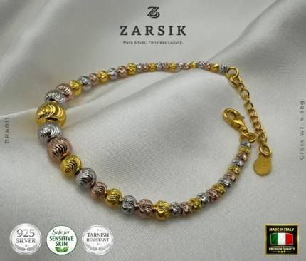 Tri-tone 925 sterling silver beaded bracelet with 18K gold, rose gold, and rhodium plating, Italian-made luxury jewellery on a clean background