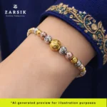 Elegant woman wearing Italian-made tri-tone 925 silver beaded bracelet with textured beads and adjustable chain styled for everyday luxury