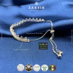 925 sterling silver dual-row CZ bolo bracelet with rhodium plated finish and adjustable slider clasp on white background