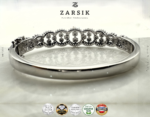 Close-up macro view of cubic zirconia stones set in 925 sterling silver rhodium plated bracelet showing fine Thai craftsmanship and sparkle detail
