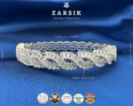 Close-up of cubic zirconia stones set in 925 sterling silver rhodium plated wave bracelet showing diamond-like brilliance and fine detailing