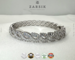 925 sterling silver rhodium plated CZ wave bracelet showcasing elegant interwoven design with sparkling cubic zirconia stones