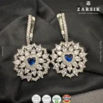 Radiant floral halo earrings in 925 sterling silver with deep blue center stone and rhodium plated finish