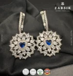 Radiant floral halo earrings in 925 sterling silver with deep blue center stone and rhodium plated finish