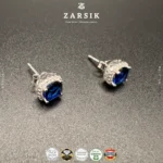 Midnight Aura 925 sterling silver stud earrings with sapphire-blue center stones and sparkling CZ halo
