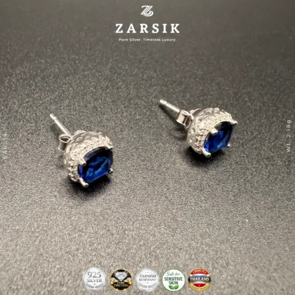 Midnight Aura 925 sterling silver stud earrings with sapphire-blue center stones and sparkling CZ halo