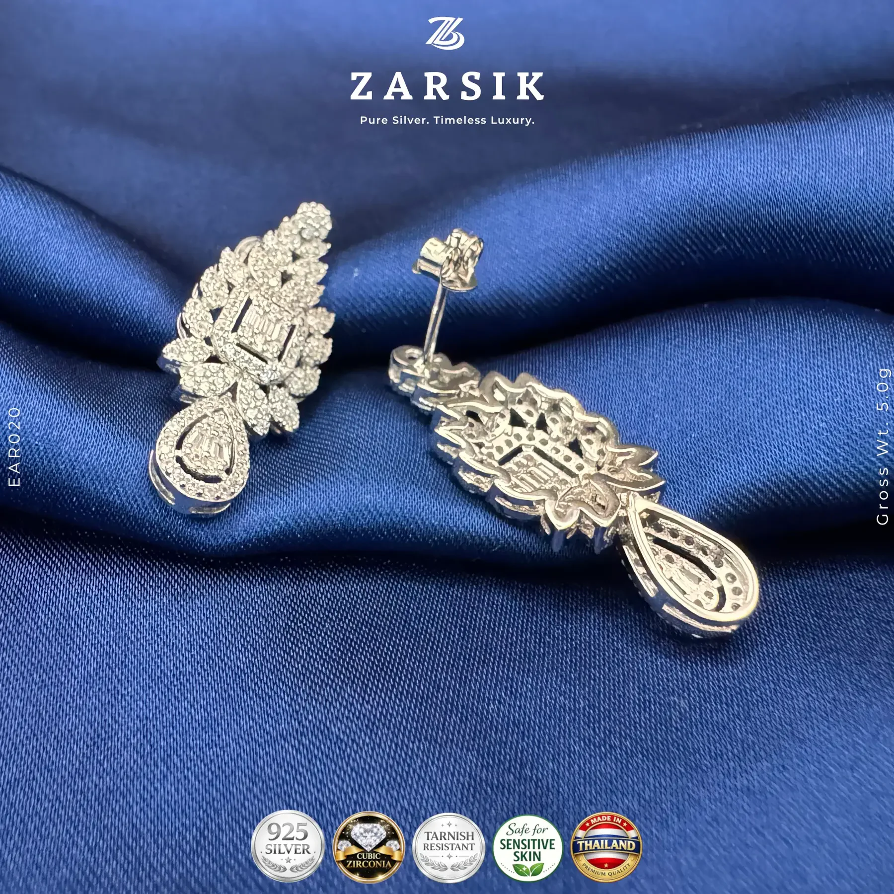 Radiant Teardrop Bloom Earrings in 925 Sterling Silver with CZ Radiant teardrop bloom earrings in 925 sterling silver with sparkling Cubic Zirconia and rhodium plating