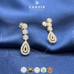 Radiant teardrop cascade earrings in 925 sterling silver with sparkling Cubic Zirconia and rhodium plating