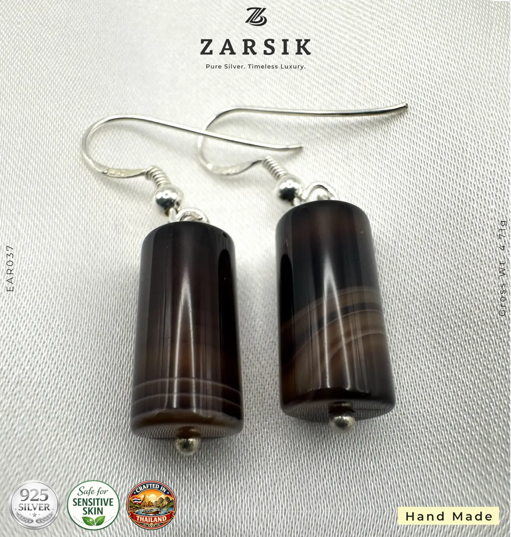 Handmade 925 silver stripe stone drop earrings Handmade 925 silver stripe stone drop earrings with cylindrical brown and grey stones