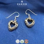 Pure 925 silver filigree heart drop earrings showing polished openwork design