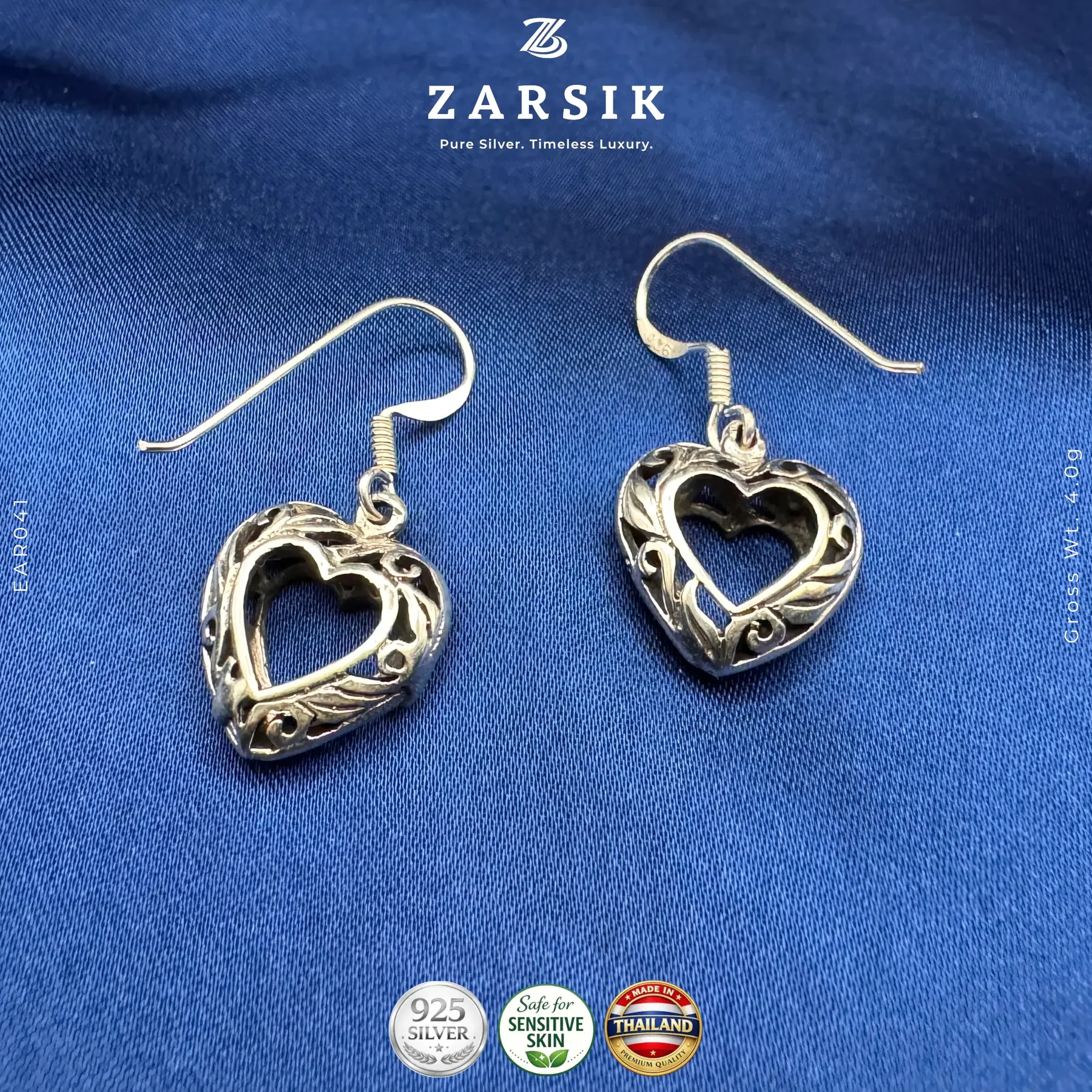Pure 925 Silver Filigree Heart Drop Earrings - Thai Elegance Pure 925 silver filigree heart drop earrings showing polished openwork design