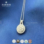 Close up of circular 925 sterling silver pendant showing natural single cut diamonds and rhodium plated finish, made in Thailand