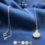 925 sterling silver diamond pendant necklace with natural single cut diamonds in circular design, rhodium plated, on white background