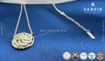 Close-up of 925 silver 360° rotating cubic zirconia pendant showing pavé stones and rhodium-plated circular dial