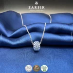Tyre Glide crystal pendant necklace in 925 sterling silver with icy blue glow and polished chain