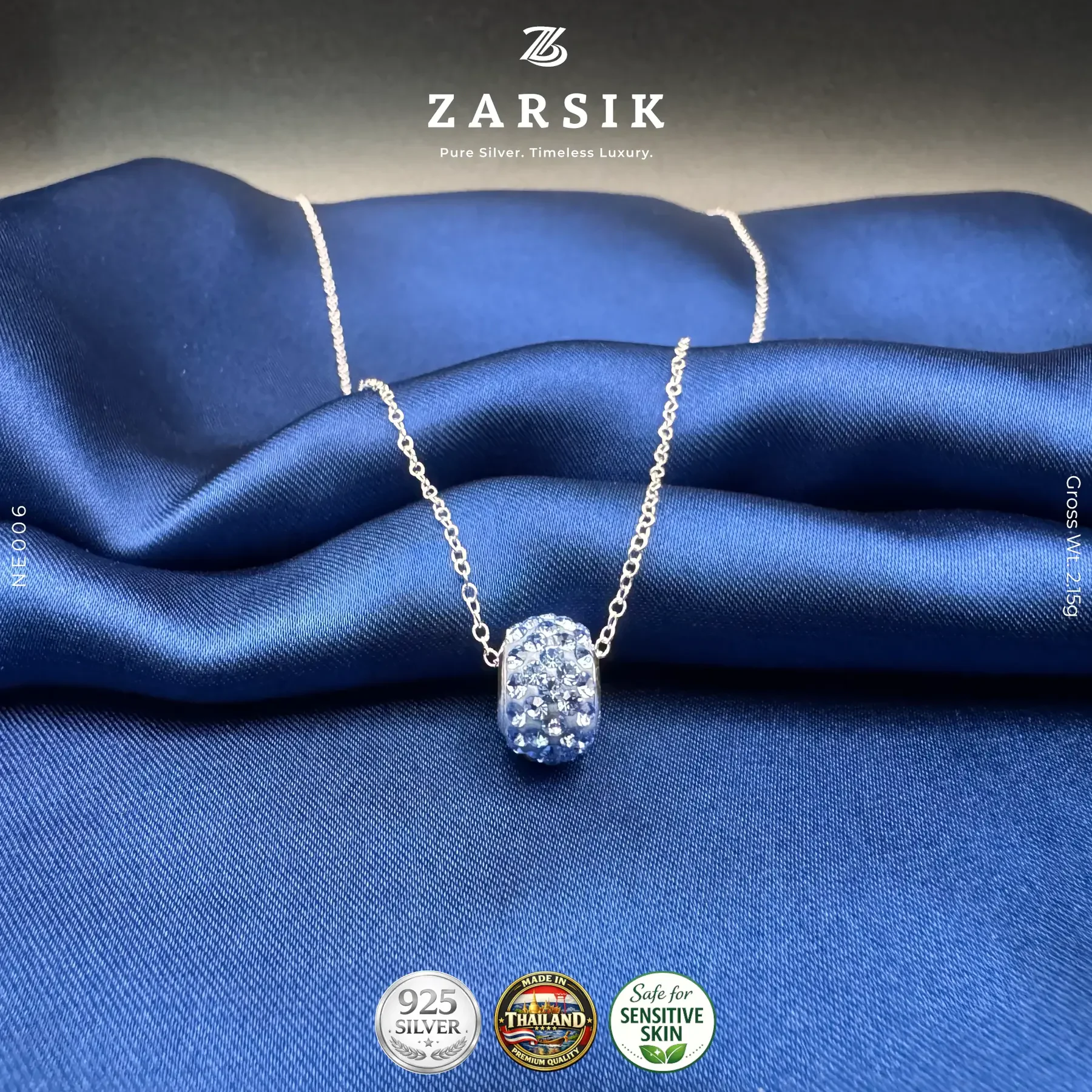 NE006_2 Tyre Glide crystal pendant necklace in 925 sterling silver with icy blue glow and polished chain