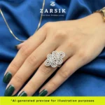 Model wearing 925 silver cubic zirconia statement ring showcasing elegant floral design and sparkle in natural light