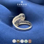 Close-up view of double halo cubic zirconia setting on 925 sterling silver rhodium plated ring