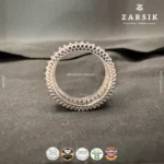 Close-up macro shot of the 925 hallmark and Cubic Zirconia stones on a silver ring.