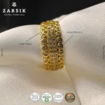 Macro close-up of the pavé set Cubic Zirconia stones on the gold plated 925 silver ribbon band