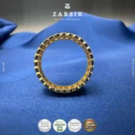 Radiant CZ Ribbon Band gold plated 925 sterling silver ring on a white studio background.