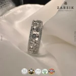 Close-up of the 925 hallmark and pavé-set borders on a rhodium-plated silver ring