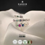 Adjustable 925 silver multi-gemstone serpentine spiral ring in Rhodium-plated finish on plain background