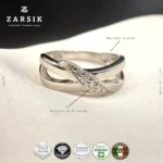 Close-up detail of Italian 925 sterling silver crossover ring featuring sparkling Moissanite stones and rhodium plating