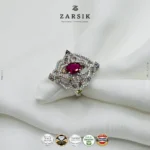 925 sterling silver statement ring with coloured centre stone and cubic zirconia halo, rhodium plated jewellery close-up