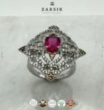 Close-up macro view of 925 sterling silver statement ring showing cubic zirconia halo, coloured centre stone, and rhodium plated finish details