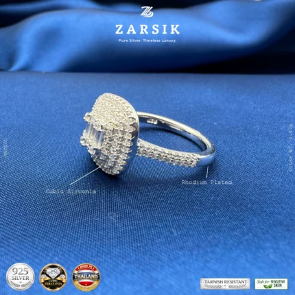 925 sterling silver cubic zirconia statement ring with rhodium plated finish by ZARSIK displayed in elegant lighting