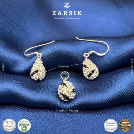 Rhodium plated 925 sterling silver jewelry set featuring a pendant and drop earrings pave-set with sparkling white crystals and black crystal stripes