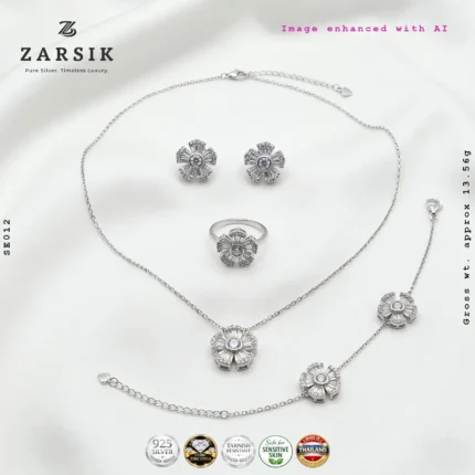 4-piece 925 Sterling Silver floral jewelry set featuring a pavé Cubic Zirconia blossom necklace, bracelet, ring, and stud earrings.