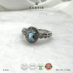 Blue Topaz 925 Silver Ring with cubic zirconia halo and rhodium-plated sterling silver band
