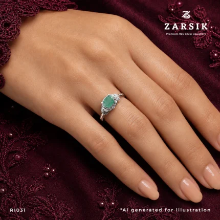 Emerald 925 Silver Ring on hand with oval emerald and cubic zirconia accents by ZARSIK