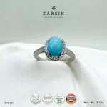 Turquoise 925 Silver Ring RI028 with oval blue centre stone, CZ halo and rhodium-plated sterling silver band by ZARSIK