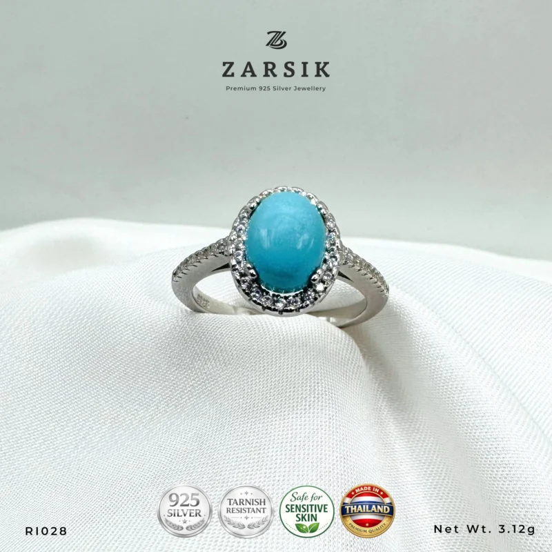 Turquoise 925 Silver Ring RI028 with oval blue centre stone, CZ halo and rhodium-plated sterling silver band by ZARSIK