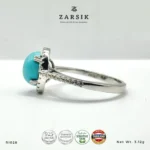Turquoise 925 Silver Ring RI028 with oval blue centre stone, CZ halo and rhodium-plated sterling silver band by ZARSIK