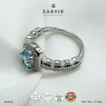 Blue Topaz 925 Silver Ring with cubic zirconia halo and rhodium-plated sterling silver band