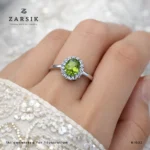 Peridot 925 Silver Ring on hand with faceted peridot and cubic zirconia accents by ZARSIK