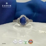 Elegant oval sapphire halo ring crafted in 925 sterling silver with sparkling cubic zirconia accents