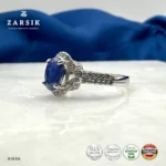 Elegant oval sapphire halo ring crafted in 925 sterling silver with sparkling cubic zirconia accents