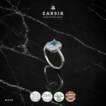 Radiant Blue Topaz Halo Ring crafted in 925 sterling silver with emerald-cut blue topaz and cubic zirconia halo