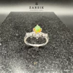 Enchanting opal floral ring crafted in 925 sterling silver with a natural oval opal and sparkling cubic zirconia accents