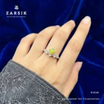 Woman wearing an elegant opal floral ring in 925 sterling silver with natural oval opal and cubic zirconia detailing