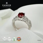 Majestic Garnet 925 Silver leaf ring with natural oval garnet and sparkling cubic zirconia detailing